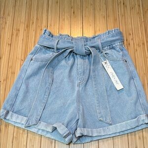 She+Sky size S light wash denim shorts. Elastic waist. Tie belt. NWT.